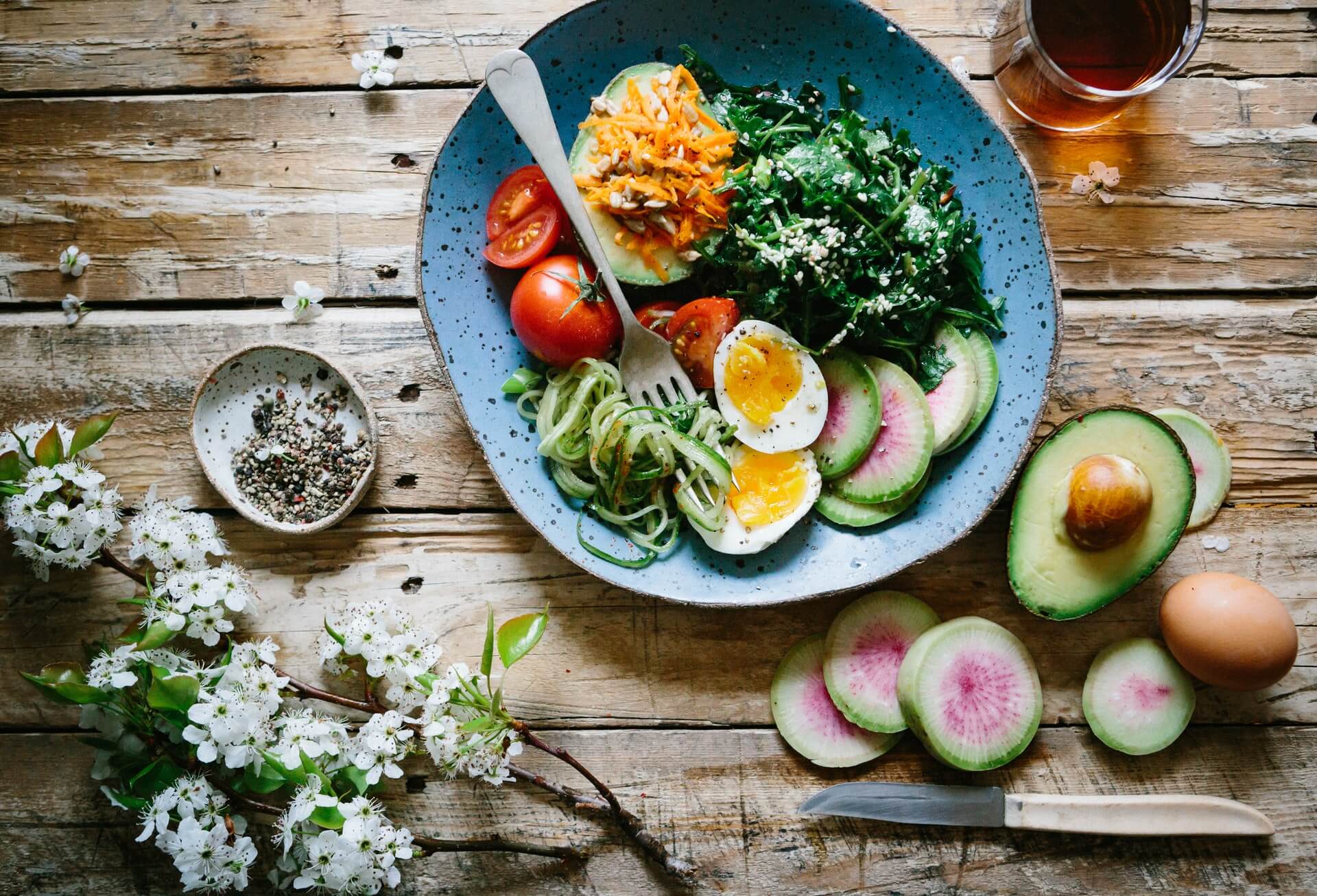 A table loaded with plenty of healthy food.