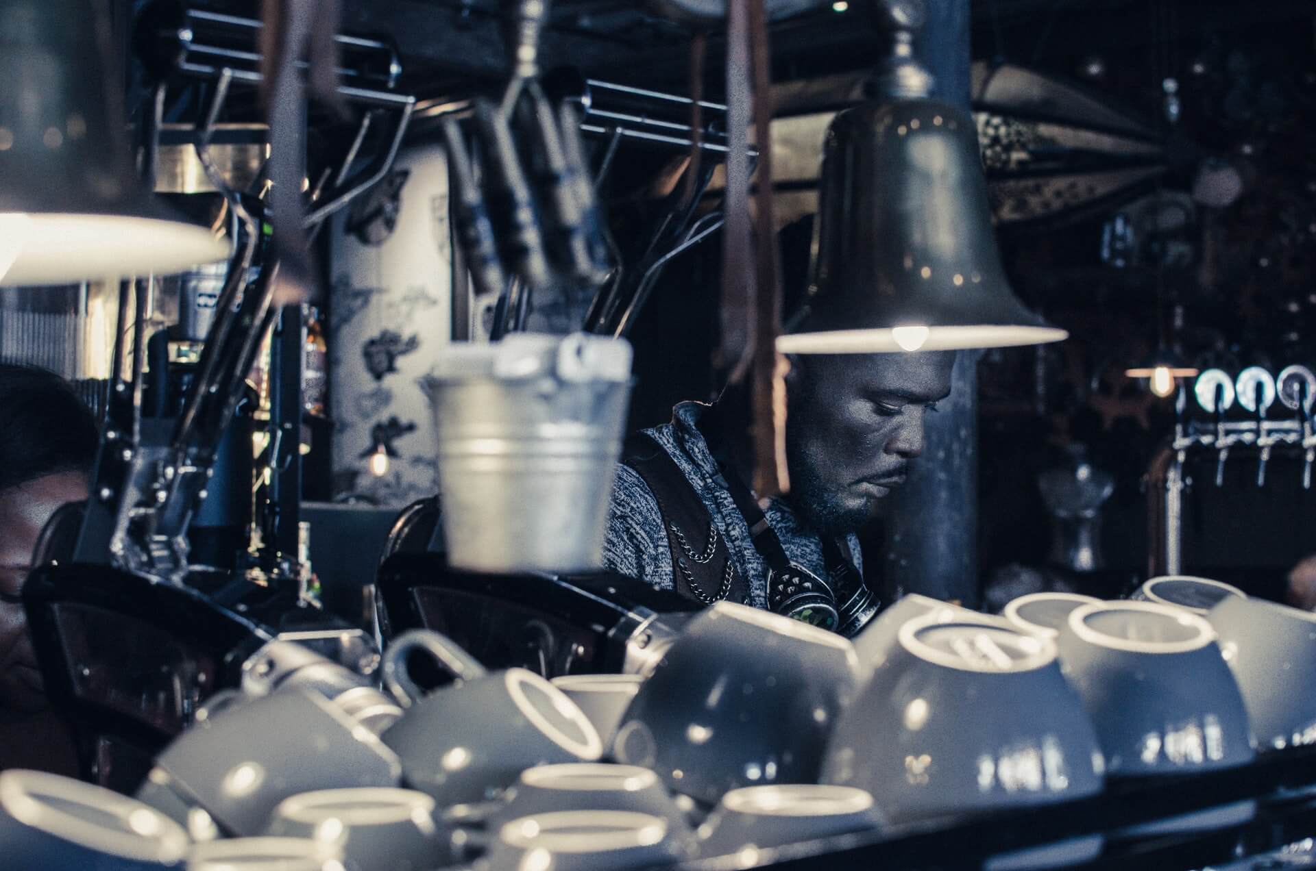 A barista preparing coffee in Truth Coffee